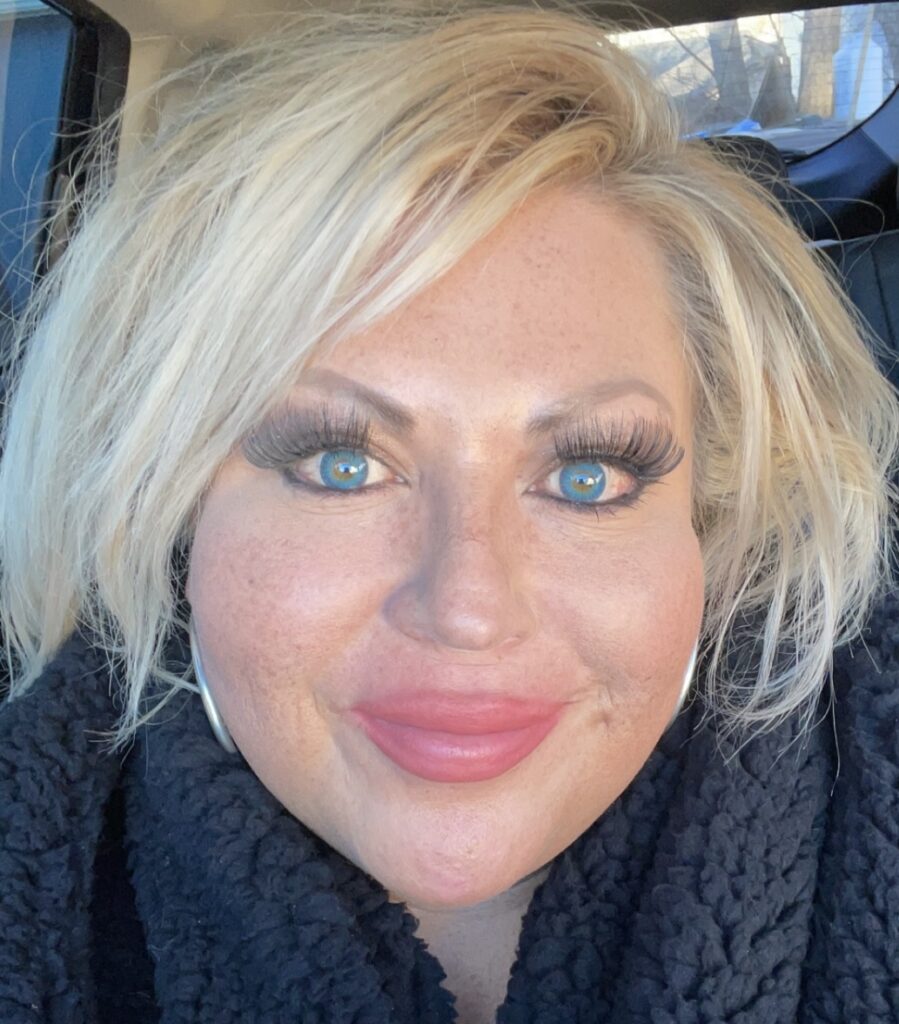 Elaina, independent hair stylist, in her relaxing salon providing personalized consultation and styling.