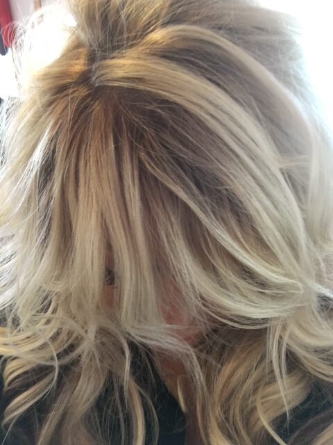 Close-up of hair styling details during a personalized appointment.