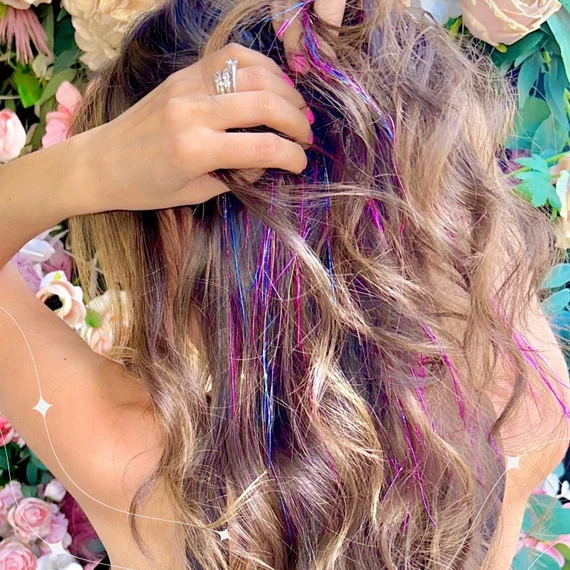 Stylized portrait showcasing finished hairstyle from salon session.