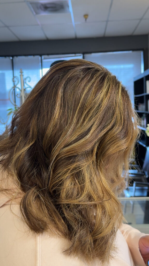 Inviting salon interior with styling stations ready for clients.